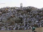 Muslim pilgrims pray on Mount Mercy on the plains of Arafat during the annual haj pilgrimage, outside the holy city of Mecca